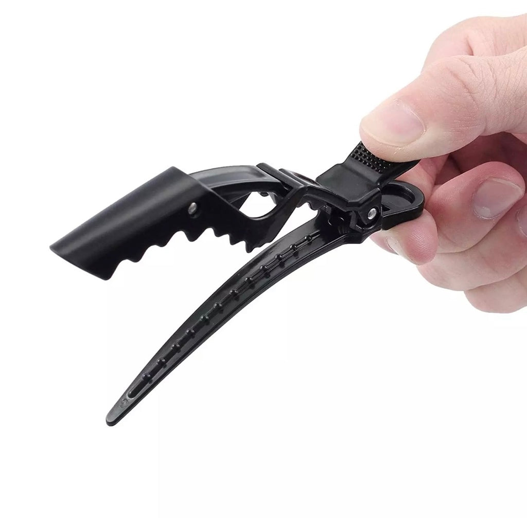 Sectioning clips 6 pack being held
